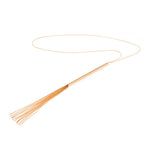 Gold-tone chain necklace with whip-shaped pendant by Bijoux Indiscrets