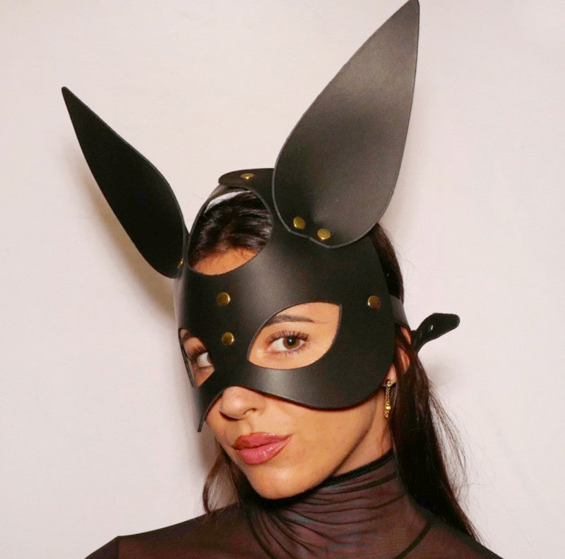 Black and gold leather rabbit ears half-mask with golden chain details