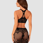 An additional view of the black cropped top and skirt set