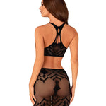An alternate view of the black cropped top and skirt set, with a form-fitting skirt