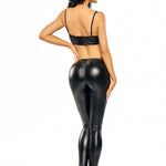 An alternate view of the Carina black wet-look leggings and top, with a transparent mesh midriff panel