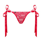 The Lovlea red lace ribbon thong, shown in an alternate image