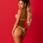An additional view of the Lustique white harness bra