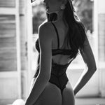 The Perisia black crotchless lace teddy shown from another angle