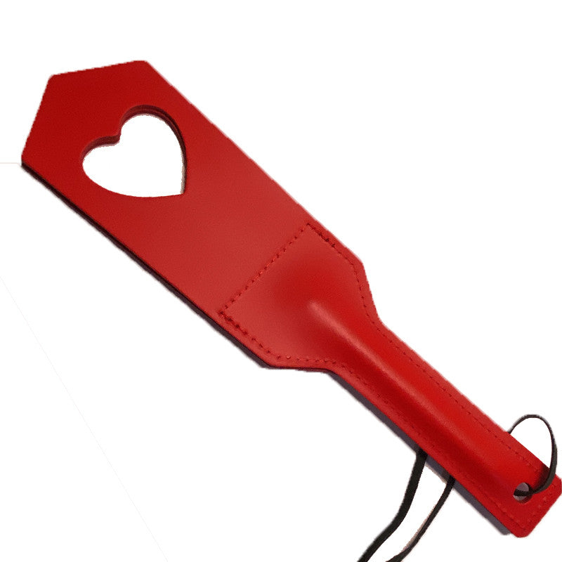 Red split leather heart paddle with heart cut-out by The Sinners
